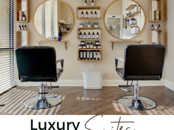 Premium salon chairs and custom decor create a luxury hair salon experience.